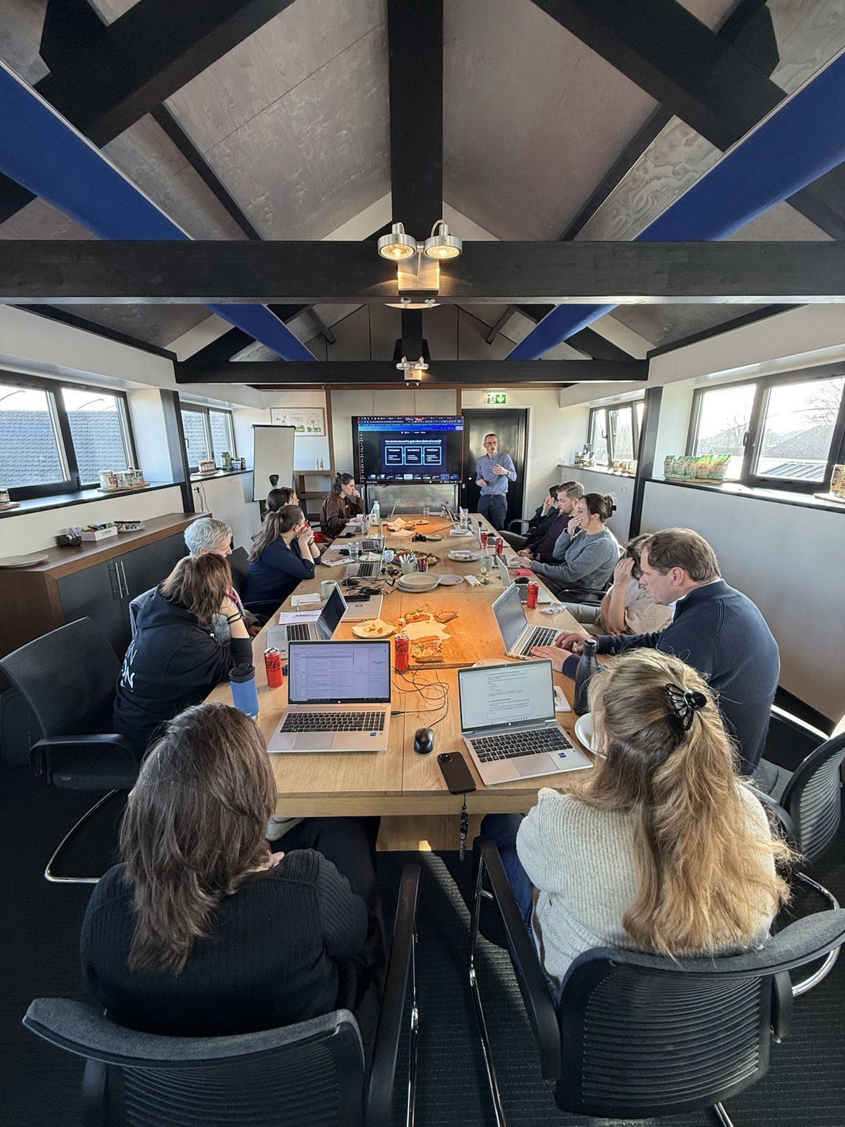 Training session around the table with laptops